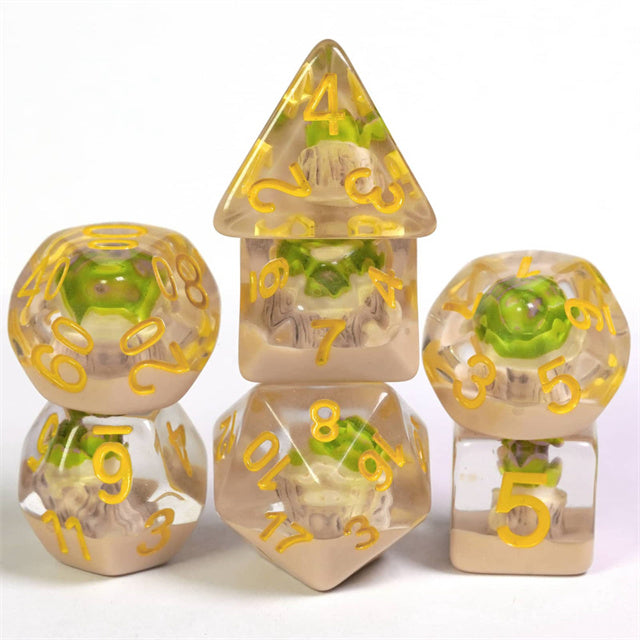 Succulent Dice Set - Transparent dice set with embedded green succulents and gold numbers, five-piece variety.