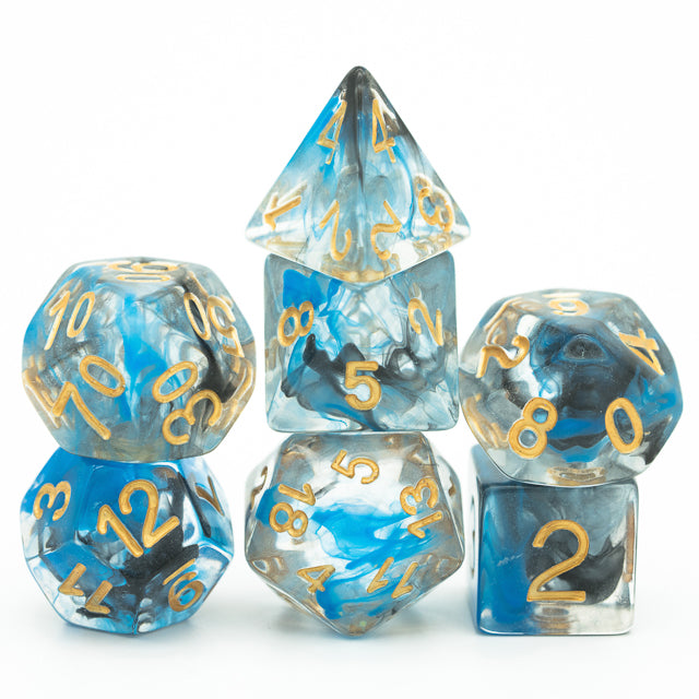 Blue & Black Smoke Dice Set - Blue and black smoke polyhedral dice set with gold numbers, including d20, d12, d10, d8, d6, and d4.
