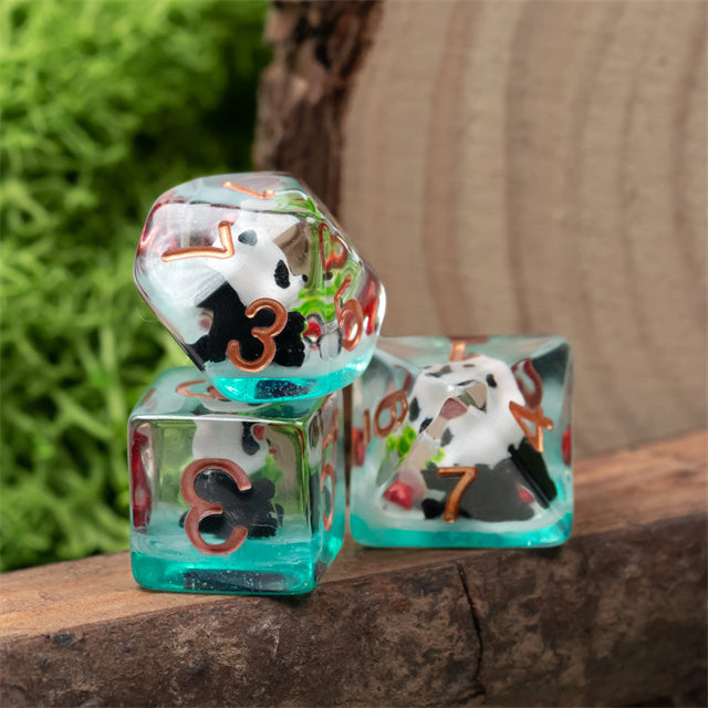 Panda & Bamboo Dice Set - Transparent teal dice set featuring panda and bamboo designs inside, with copper-colored numbers.