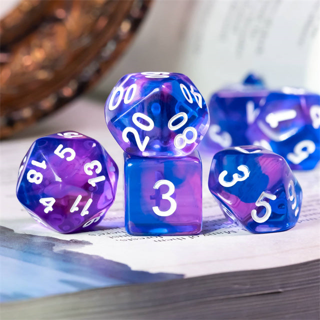 Blue & Purple Transparent Dice - Set of five blue and purple transparent acrylic dice with white numbering, including d20, d12, d10, d8, and d6 shapes.