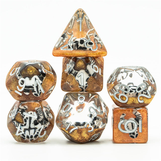 Desert Skull Dice Set - Seven-piece dice set with skull and bones design in earthy brown and white tones.