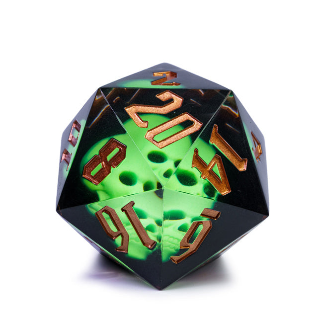 Giant 55mm D20 - Glowing Skull - Giant 55mm black resin D20 die with glowing green skulls and copper-colored numbers.