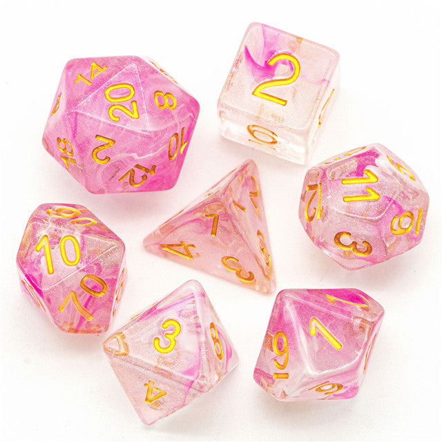 Pink Swirl and Glitter Dice Set - Set of seven translucent dice with pink swirl patterns and gold numbering, including d4, d6, d8, d10, d12, d20, and.