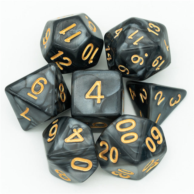 Black Marbled Dice Set - Black acrylic dice set with marbled gray swirl and gold numbering, includes multiple polyhedral shapes.