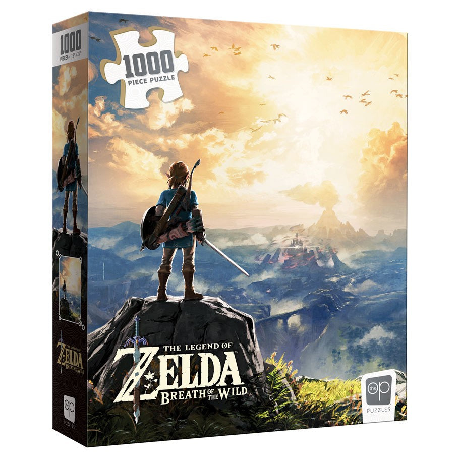 Puzzle: Zelda Breath Of The Wild 1000pc - 1000-piece Zelda Breath of the Wild puzzle box featuring hero Link overlooking a vast landscape at sunrise.