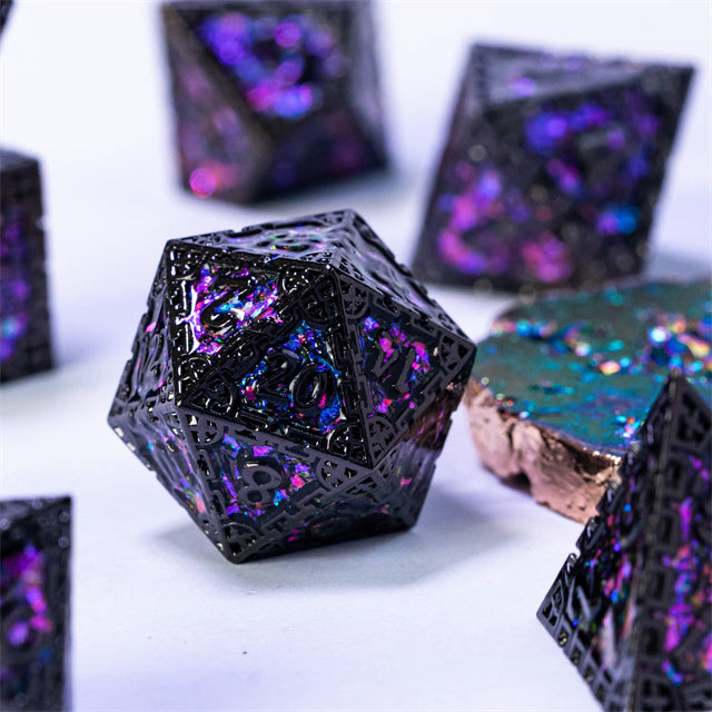Purple Cathedral Glass Metal Dice Set - Purple and blue iridescent metal dice set with intricate cathedral glass-like texture, featuring multiple polyhedral shapes.
