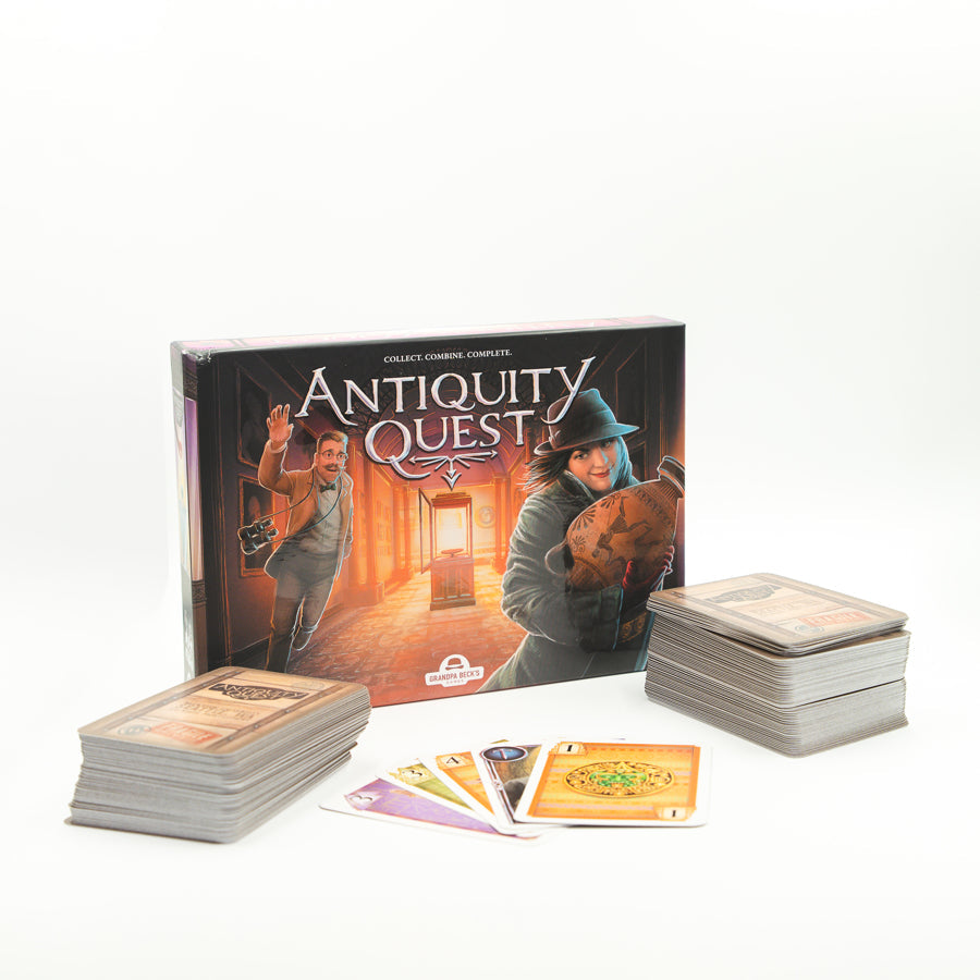 Antiquity Quest - Antiquity Quest board game box with two stacks of playing cards and five colorful cards fanned out in front.