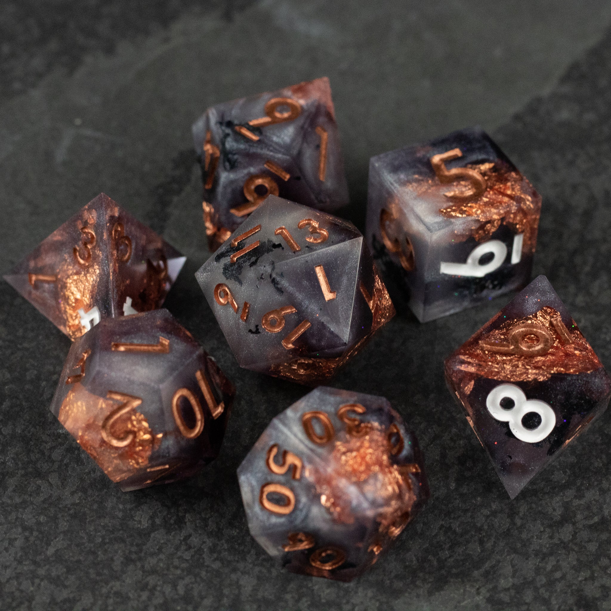 Lich King Dice Set - Black and copper metallic sharp-edged polyhedral dice set with gothic numerals.