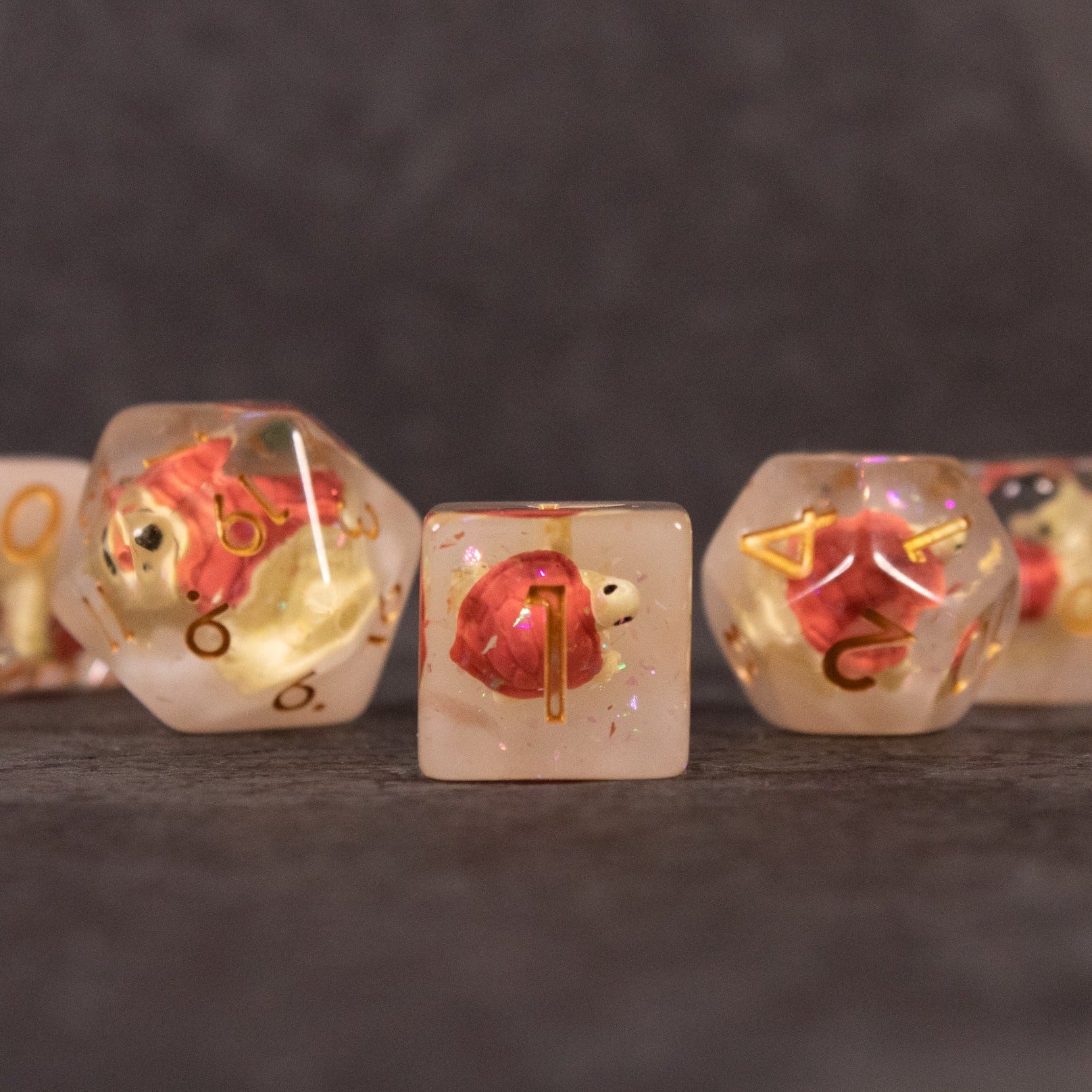 Brown Turtle Dice Set - Translucent dice set with embedded brown and red turtle figurines inside each die.