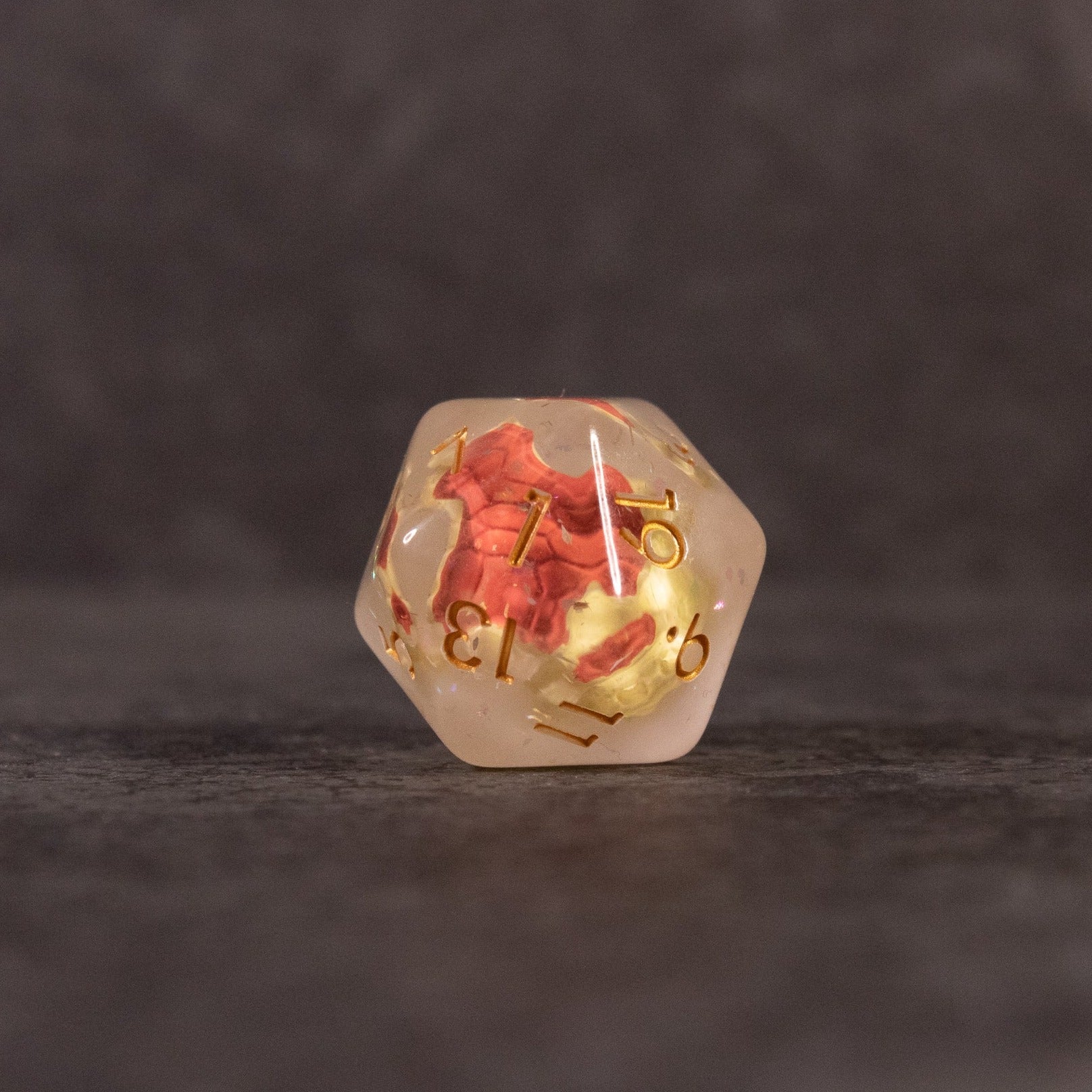 Brown Turtle Dice Set - Clear d20 dice with gold numbers and a small detailed brown turtle figurine inside.
