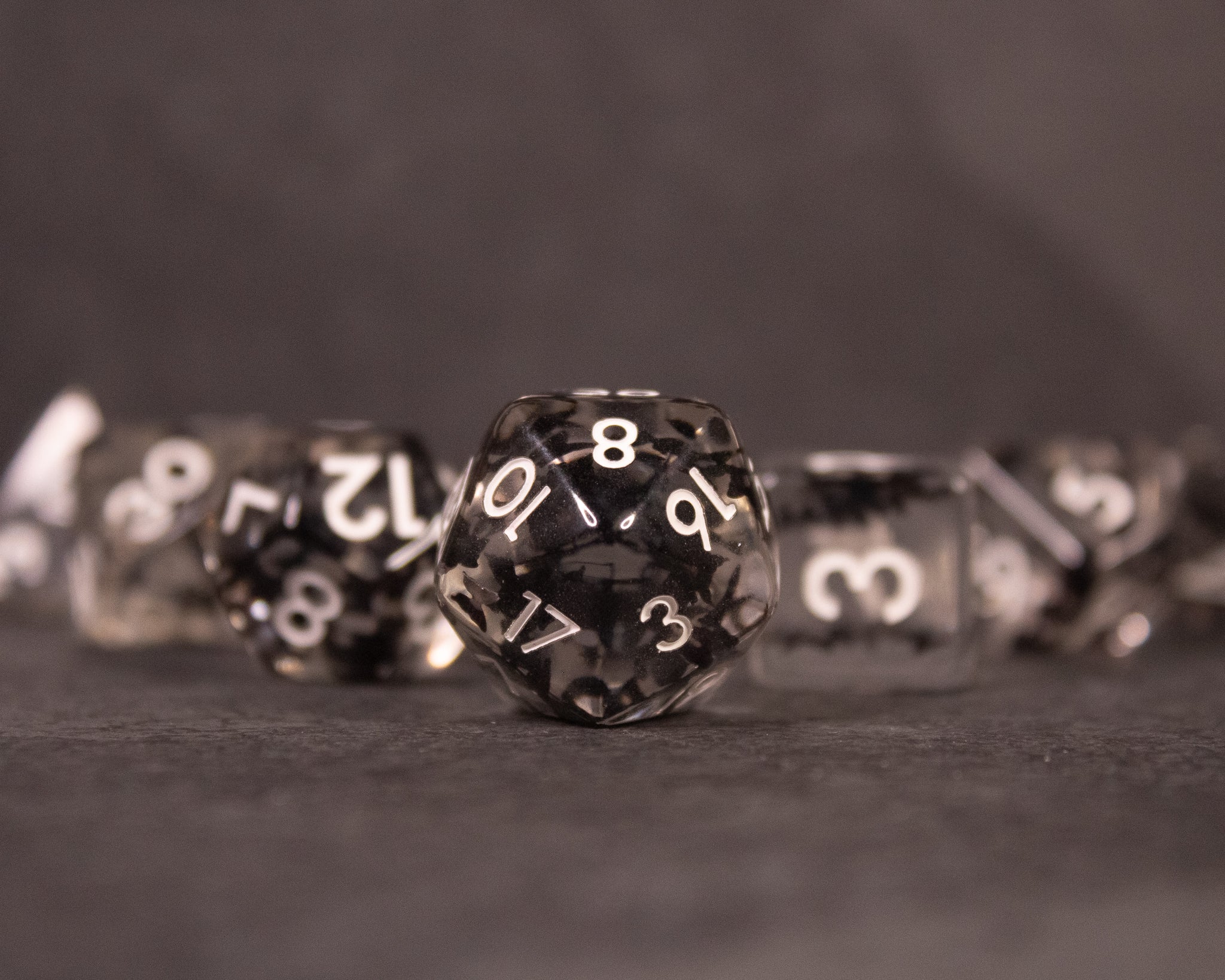 Black Butterfly Dice Set - Black translucent polyhedral dice set with white numbers, featuring a butterfly pattern inside.