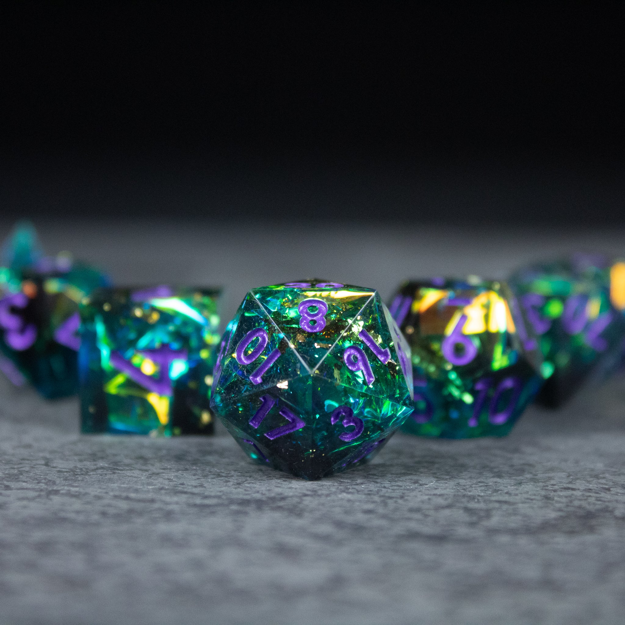 Deathblight Dice Set - Blue and purple iridescent sharp-edged d20 dice with glowing purple numbers, necromancer style.