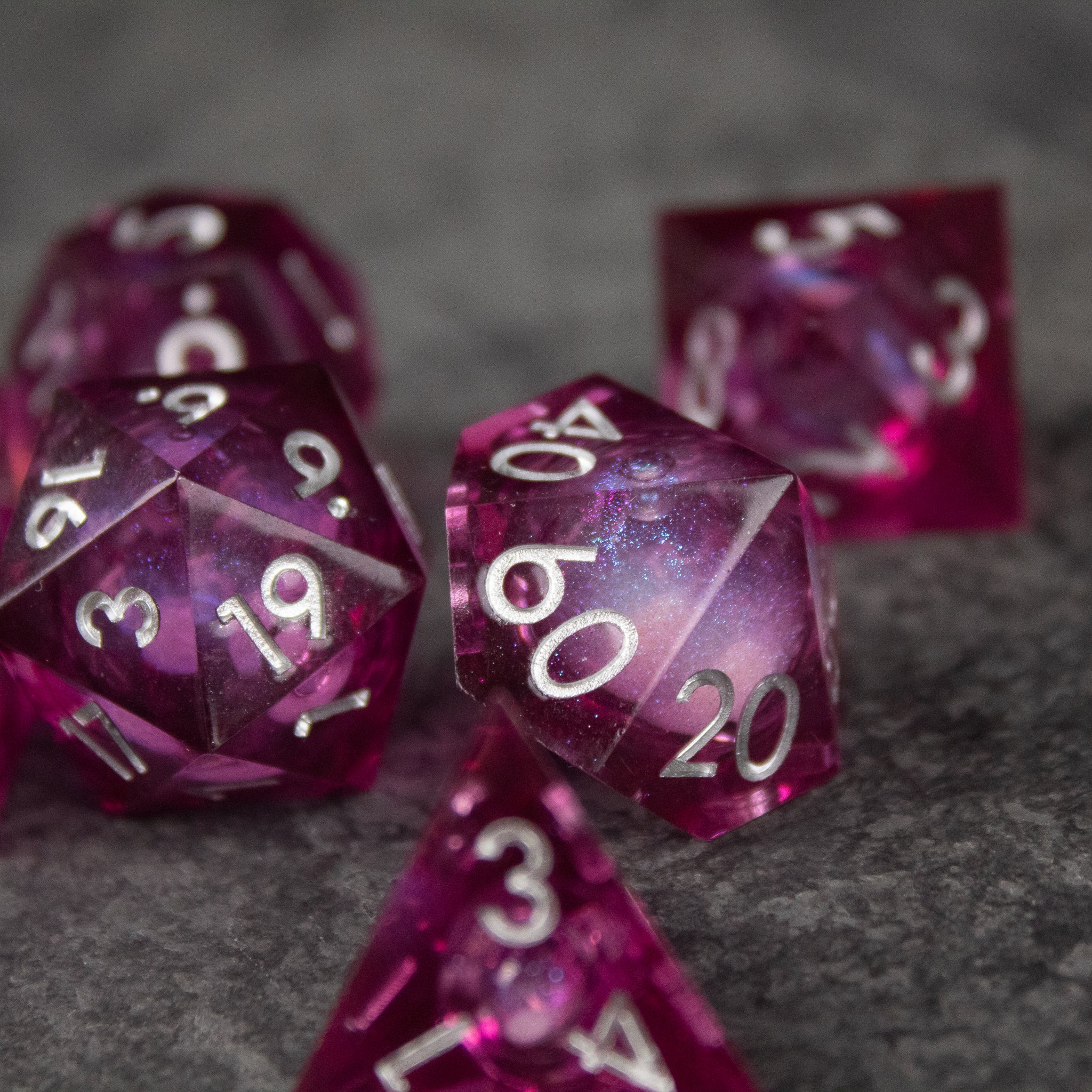 Magic Wine - Liquid Core Dice Set - Set of six transparent deep red sharp-edged dice with white numbers, featuring a liquid core effect.