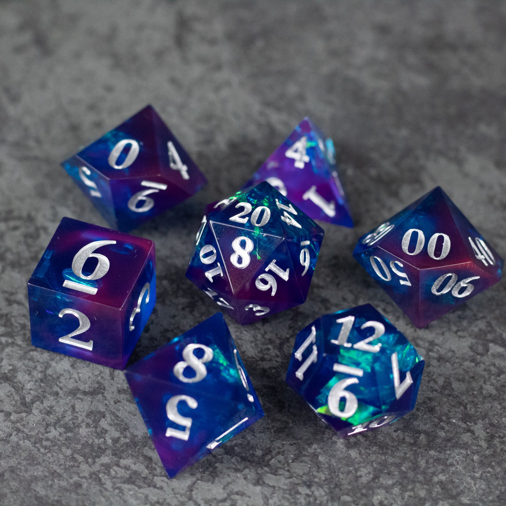 Midnight Blue Dice Set - Set of seven sharp-edged dice in deep midnight blue with white numbering, including d4, d6, d8, d10, d12, d20, and.