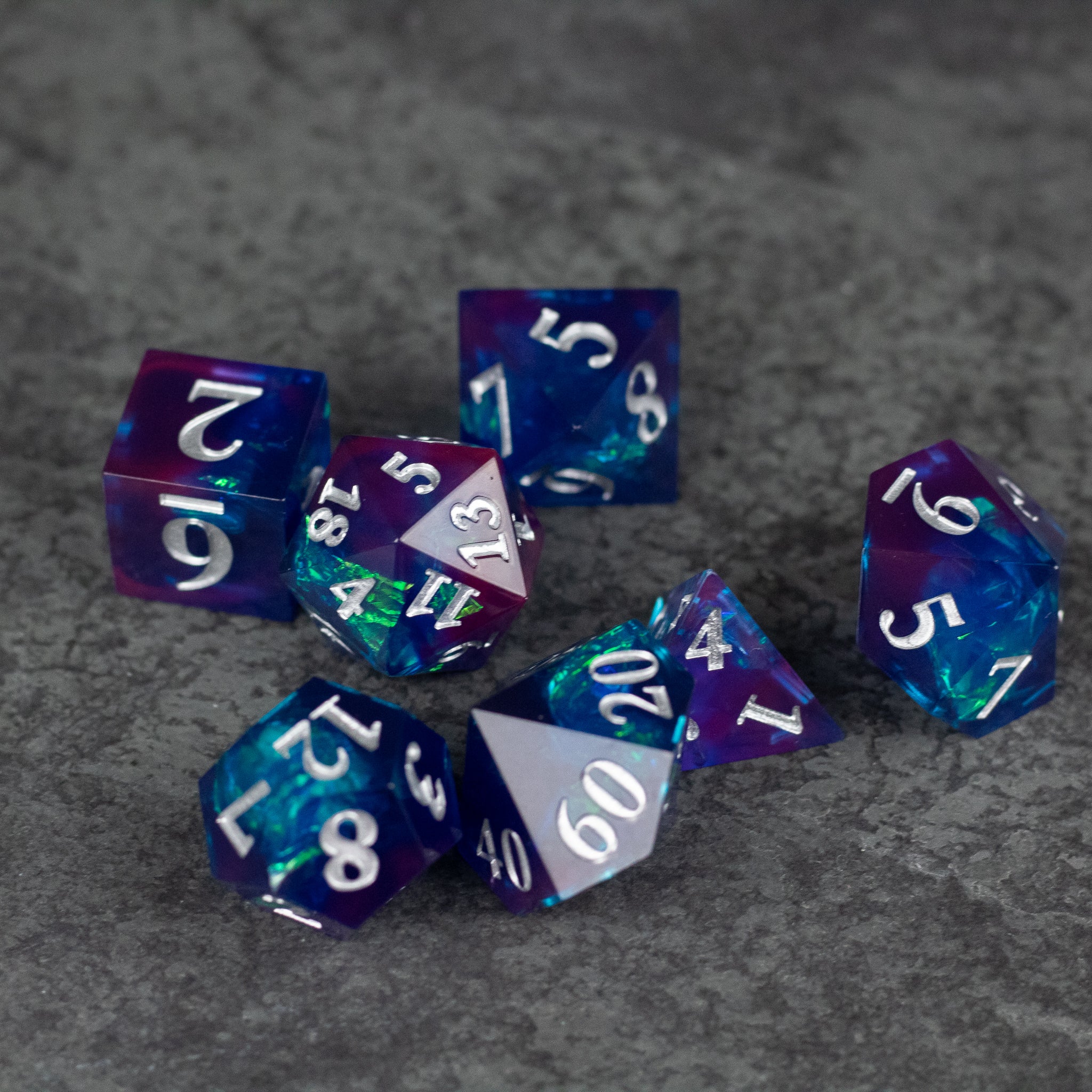 Midnight Blue Dice Set - Set of seven sharp-edged polyhedral dice in deep midnight blue with white numbering.