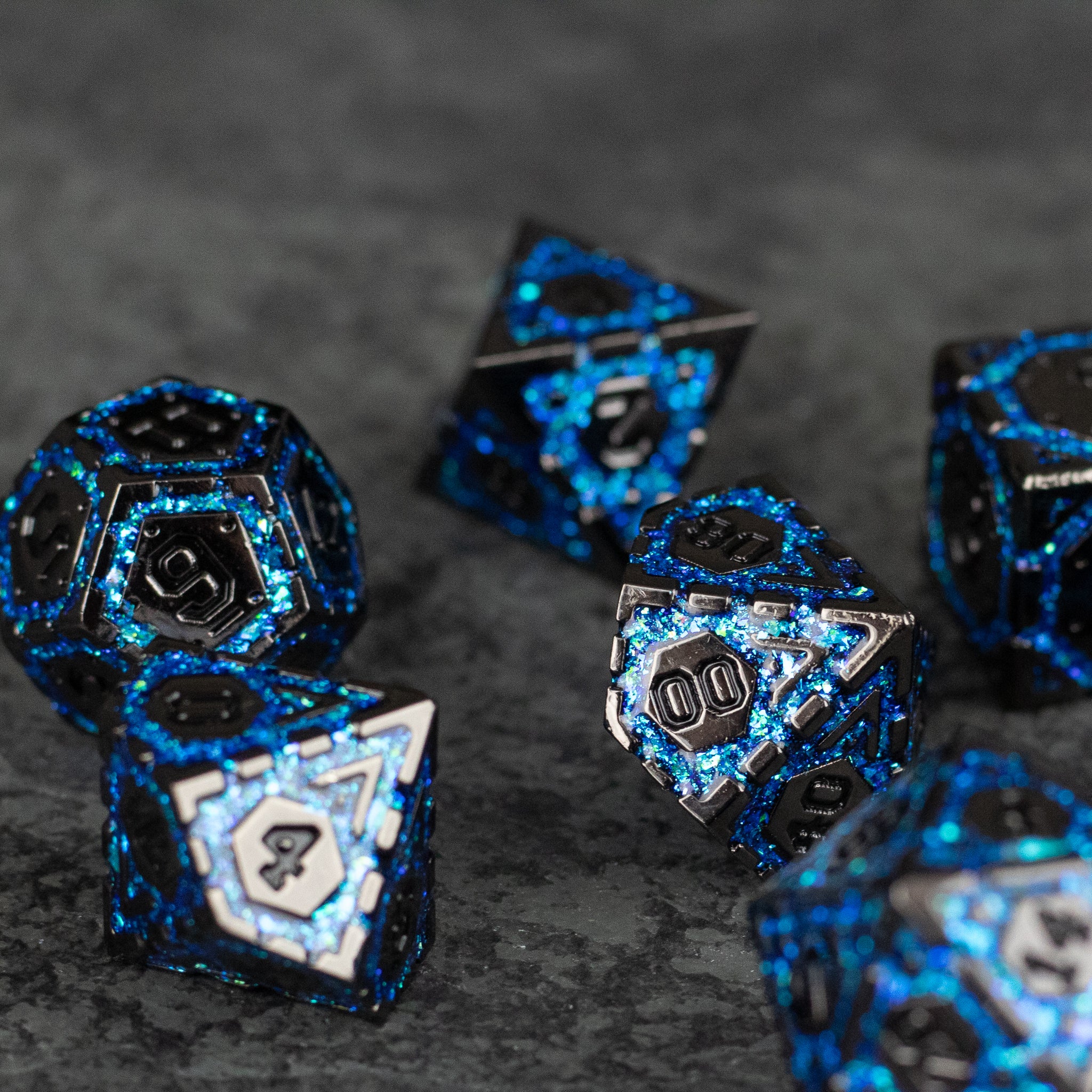 Blue Arcane Ward - Metal polyhedral dice set with black base and electric blue arcane rune accents.