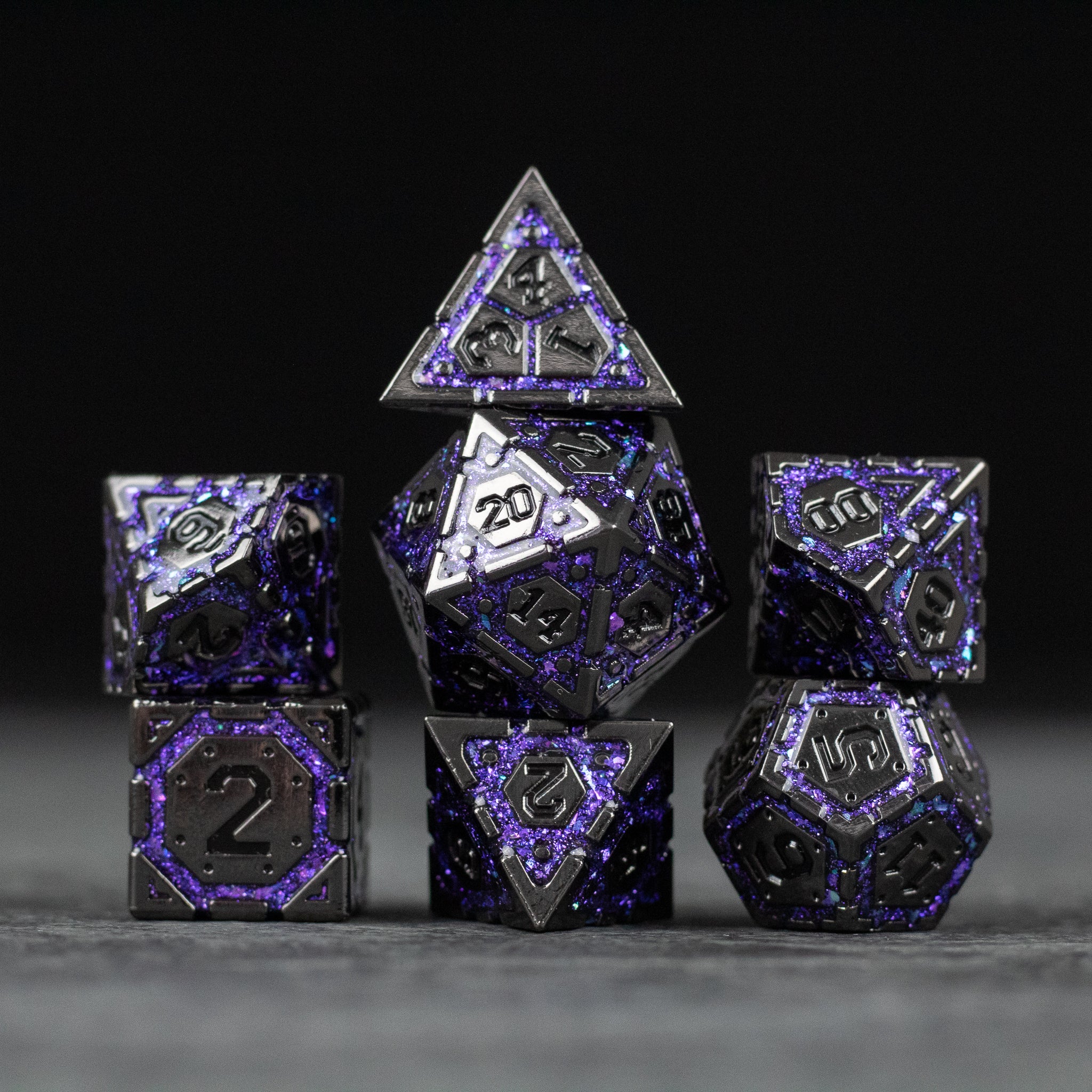 Purple Arcane Ward Dice Set - Purple and black metal seven-piece dice set with arcane symbols and silver numbering.