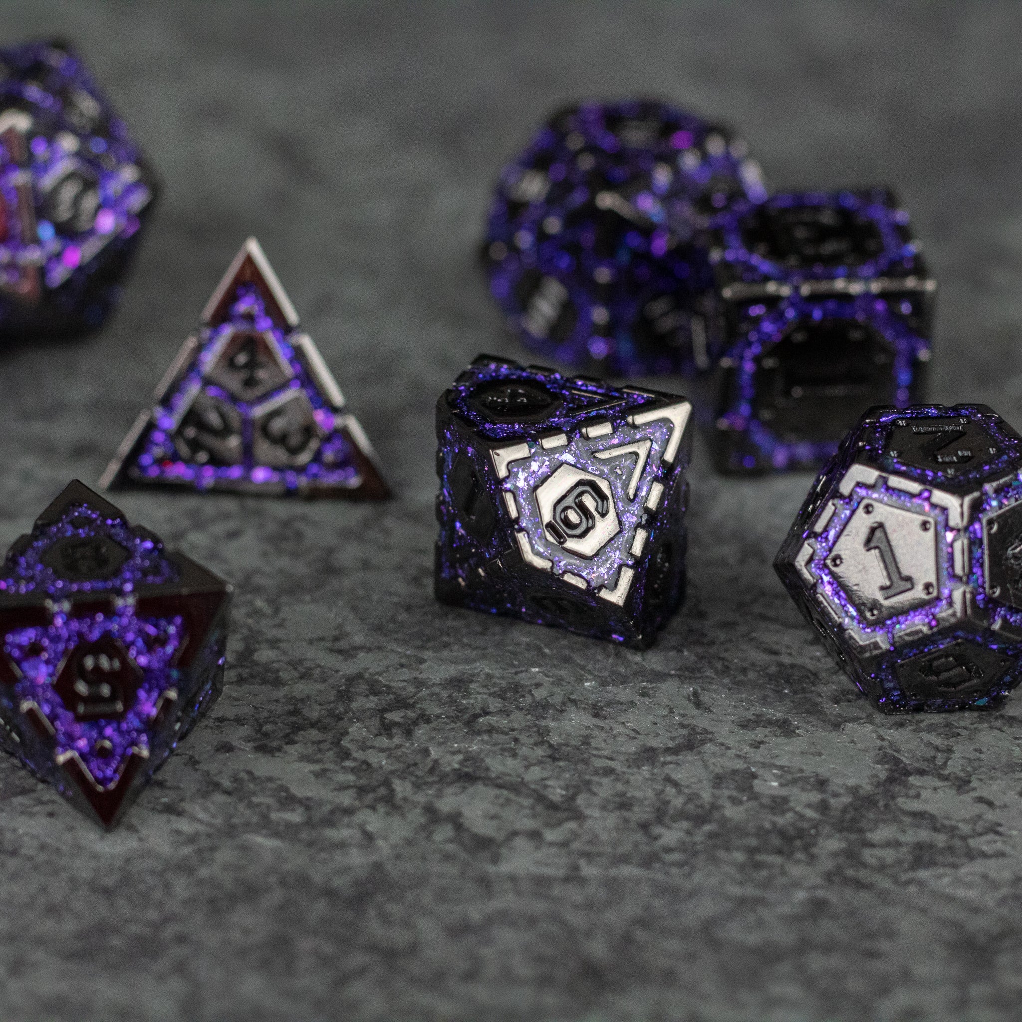 Purple Arcane Ward Dice Set - Metallic purple and black polyhedral dice set with arcane-inspired engravings and glowing numerals.