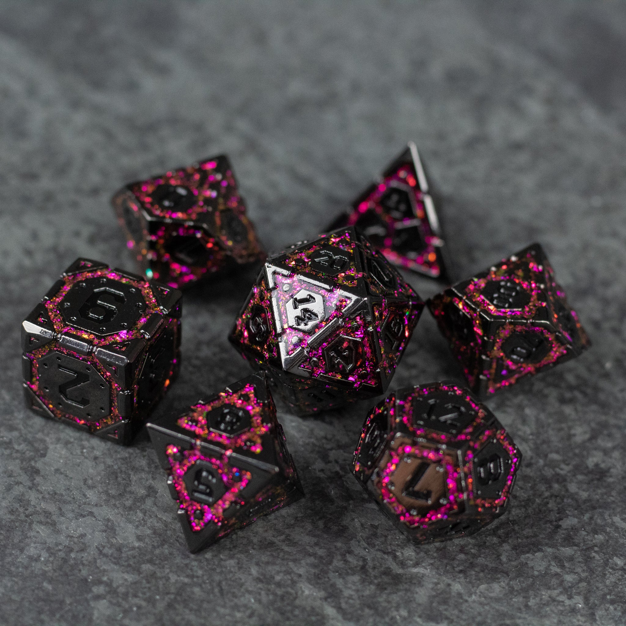 Pink Arcane Ward - Set of seven black metal polyhedral dice with glowing pink arcane symbols and numbers on a dark textured surface.