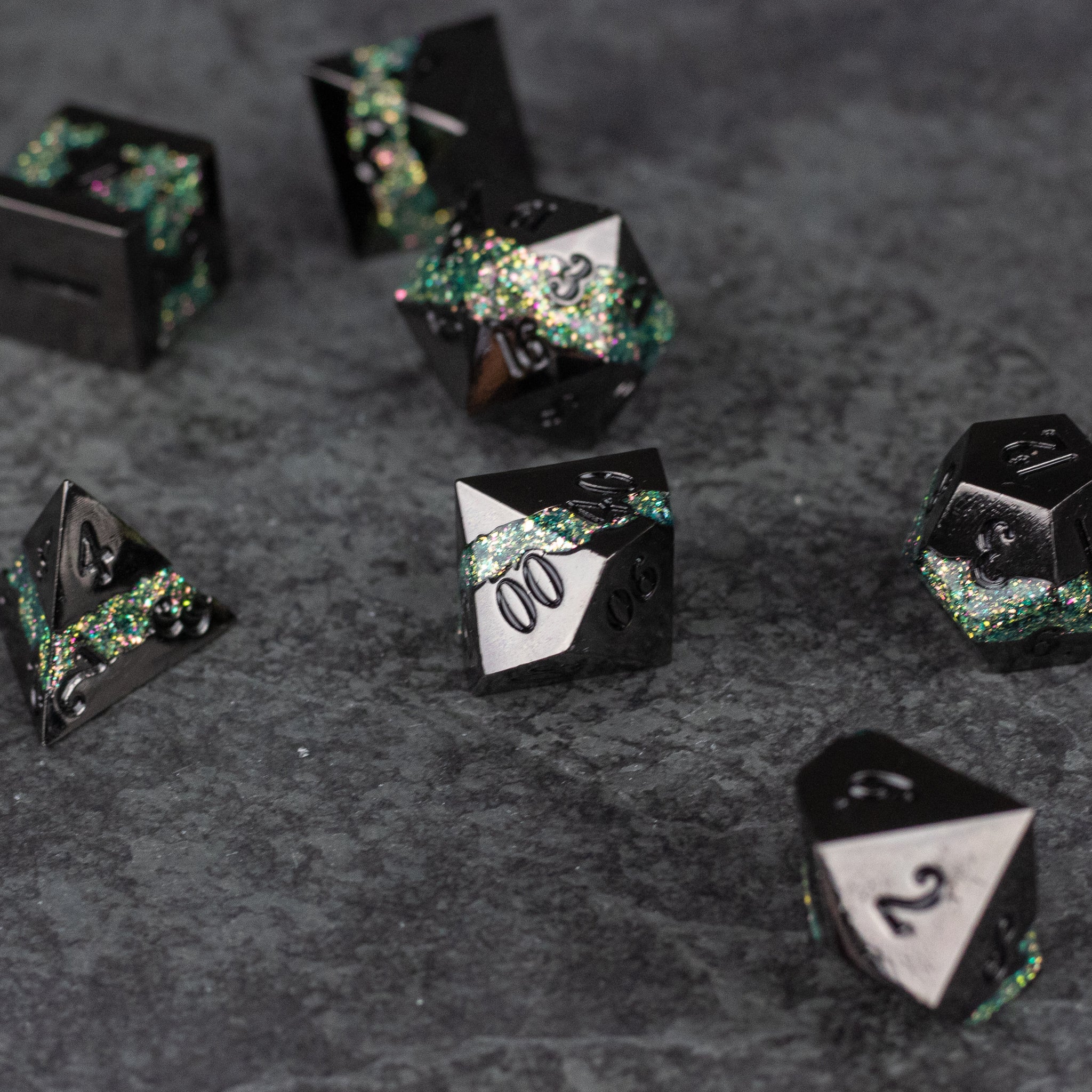 Light Green Rift Dice Set - Light green and black metal rift dice set with shimmering flecks, including d4, d6, d8, d10, d12, and d20 shapes on textured