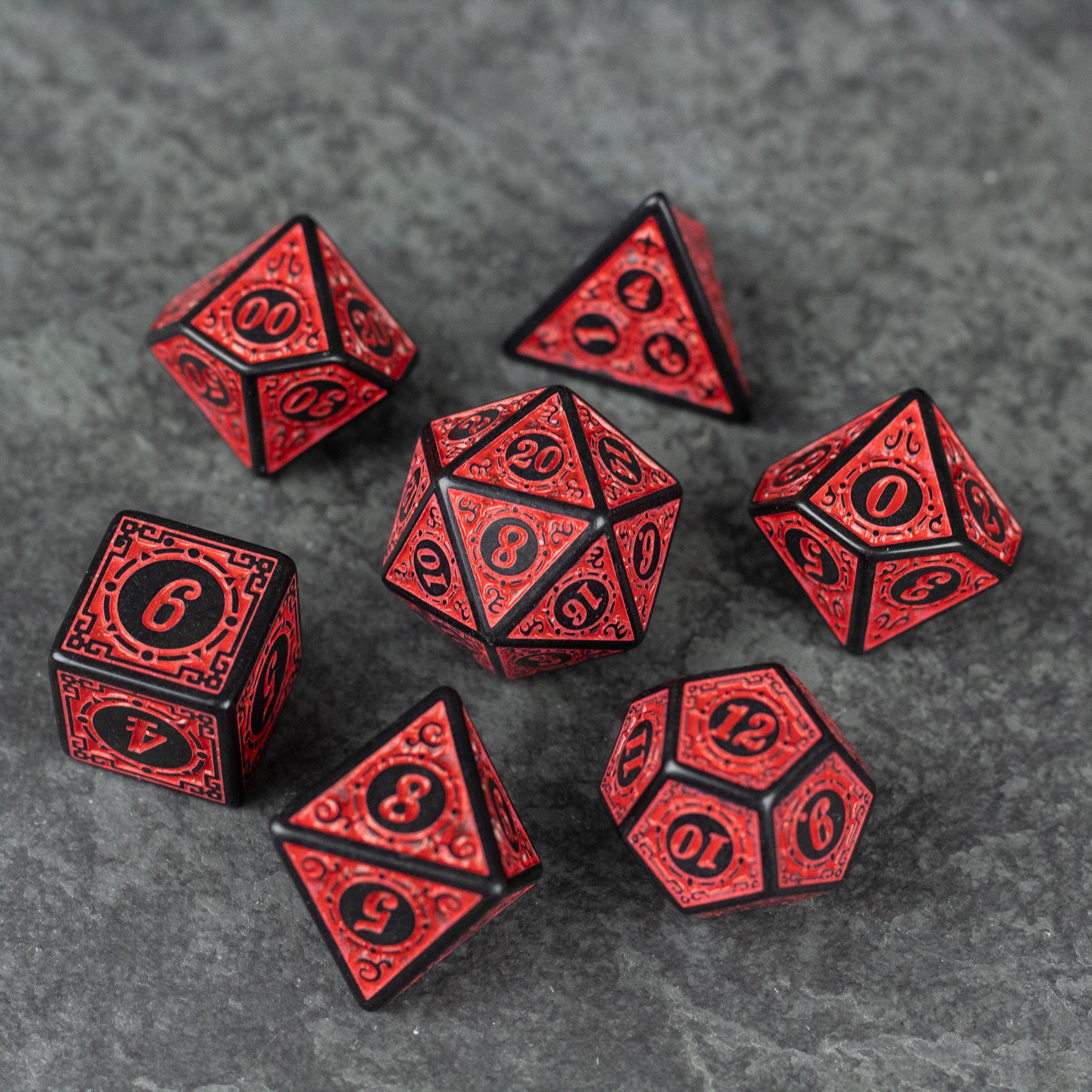 Red Runes Acrylic Dice Set - Red acrylic polyhedral dice set with black engraved runes on each face.