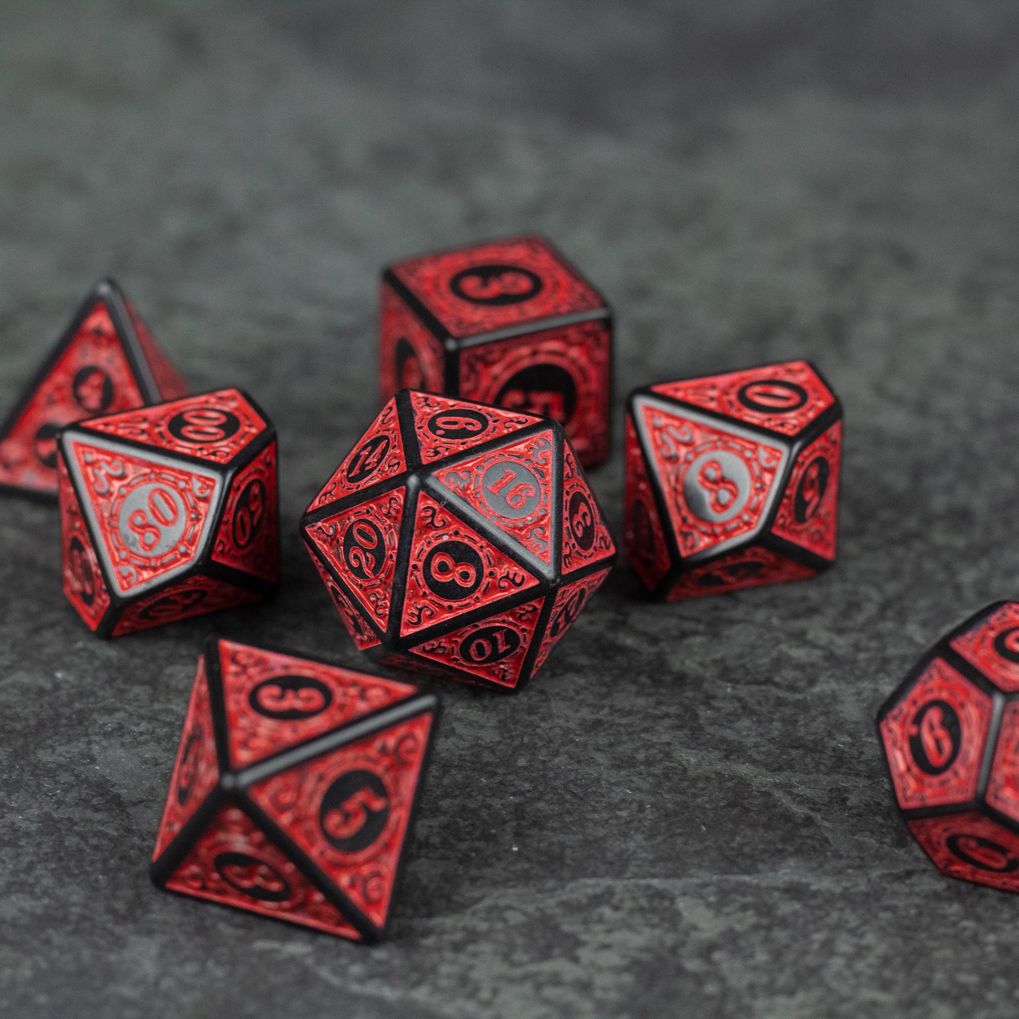 Red Runes Acrylic Dice Set - Set of red acrylic polyhedral dice with black etched rune-style numbers on each face.