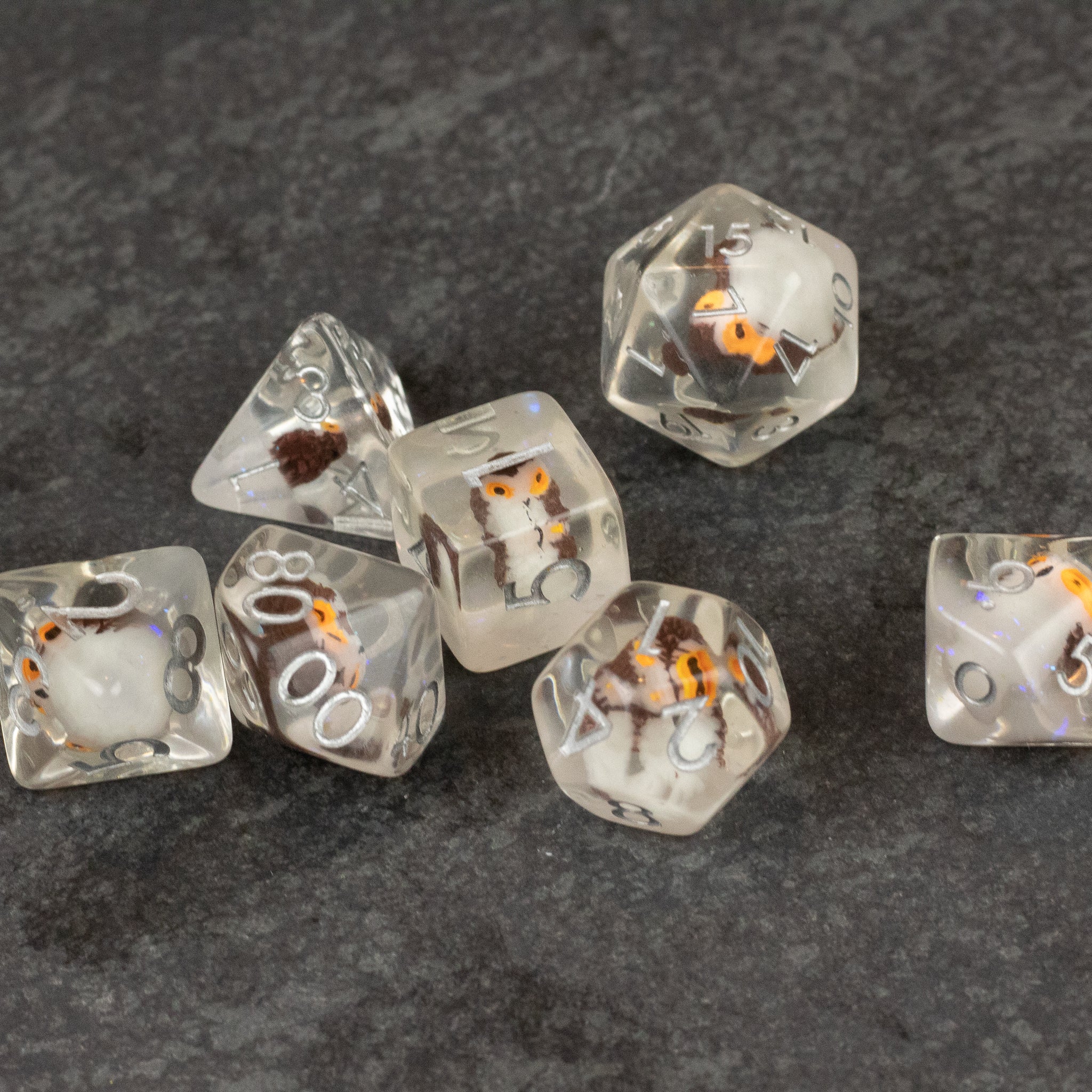 Owl Dice Set - Clear polyhedral dice set with tiny colorful owls encased inside each die.