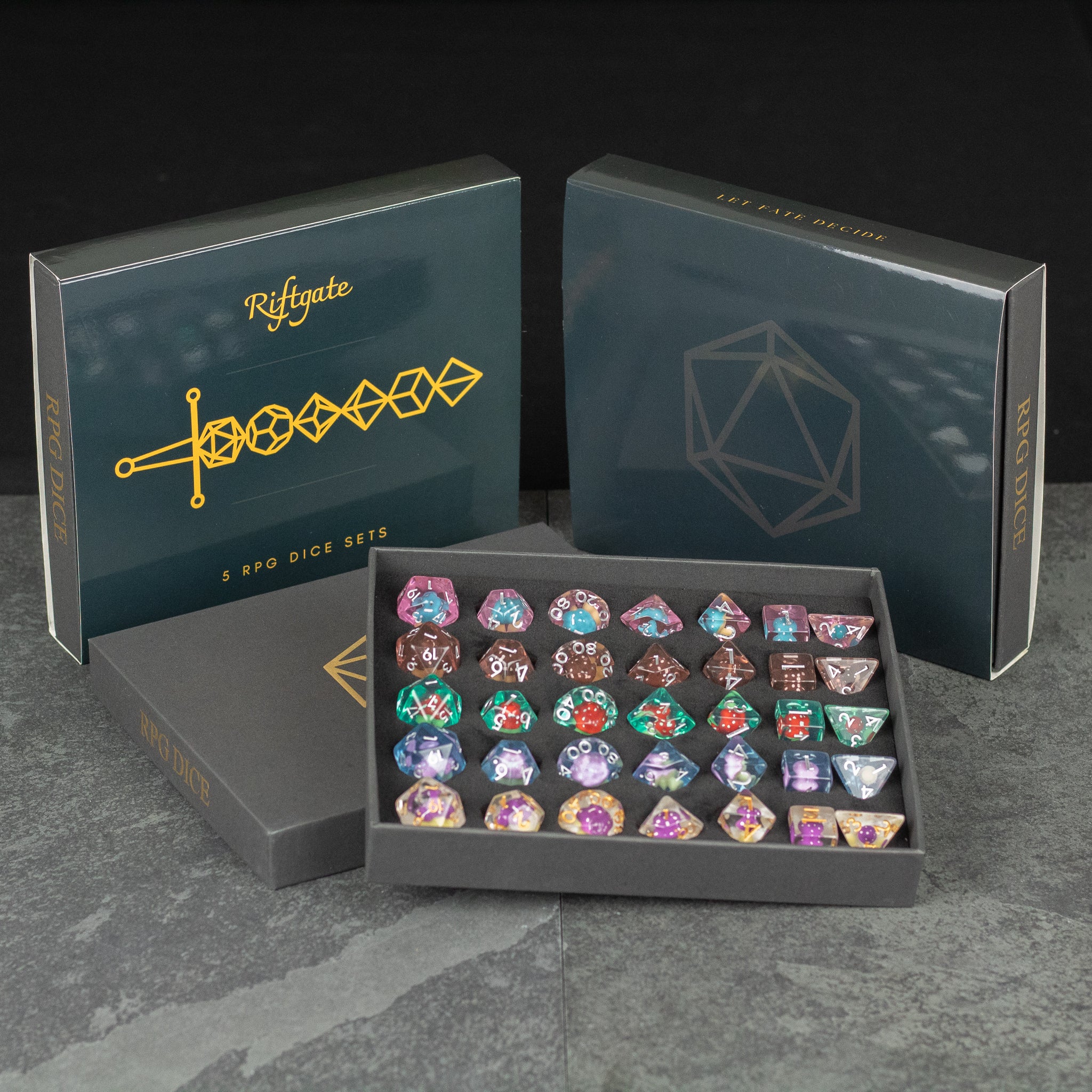 Mushroom Dice Set Gift Box - Mushroom-themed polyhedral dice set with colorful caps in black gift box with gold lettering and geometric design.