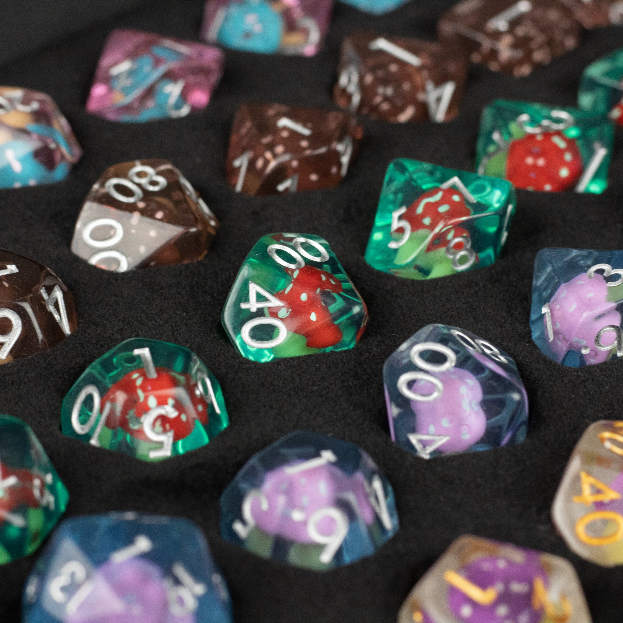 Mushroom Dice Set Gift Box - Set of colorful polyhedral dice featuring mushroom designs in a black foam gift box.