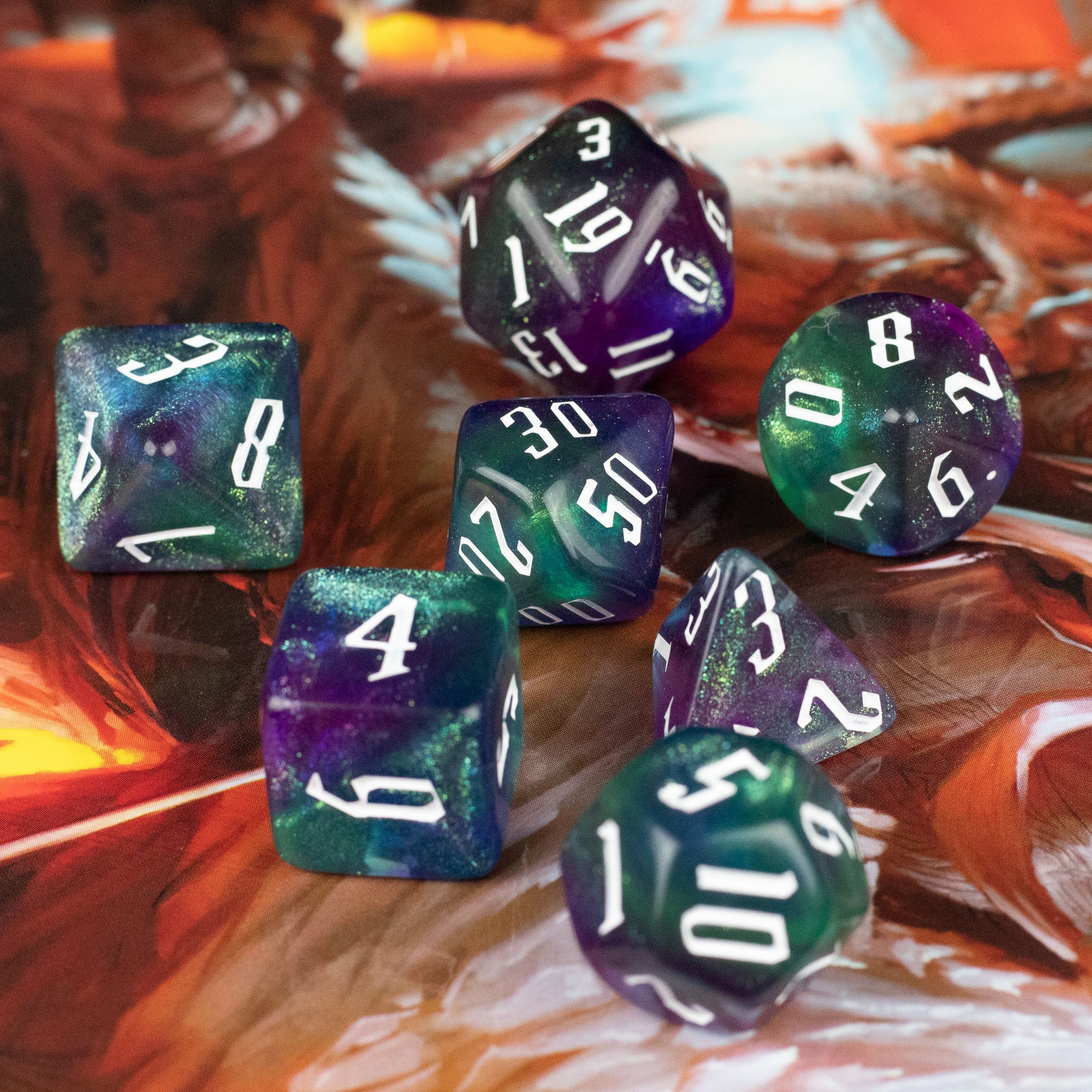 Purple & Green Glitter Dice Set - Set of purple and green translucent glitter dice with white numbering, featuring various polyhedral shapes for gaming.