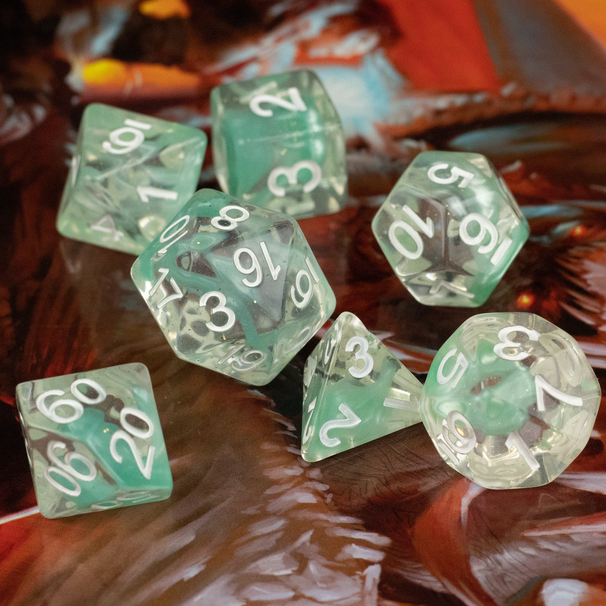 Cyan Lava Lamp Dice Set - Cyan translucent polyhedral dice set with white numbers on a textured brown surface.