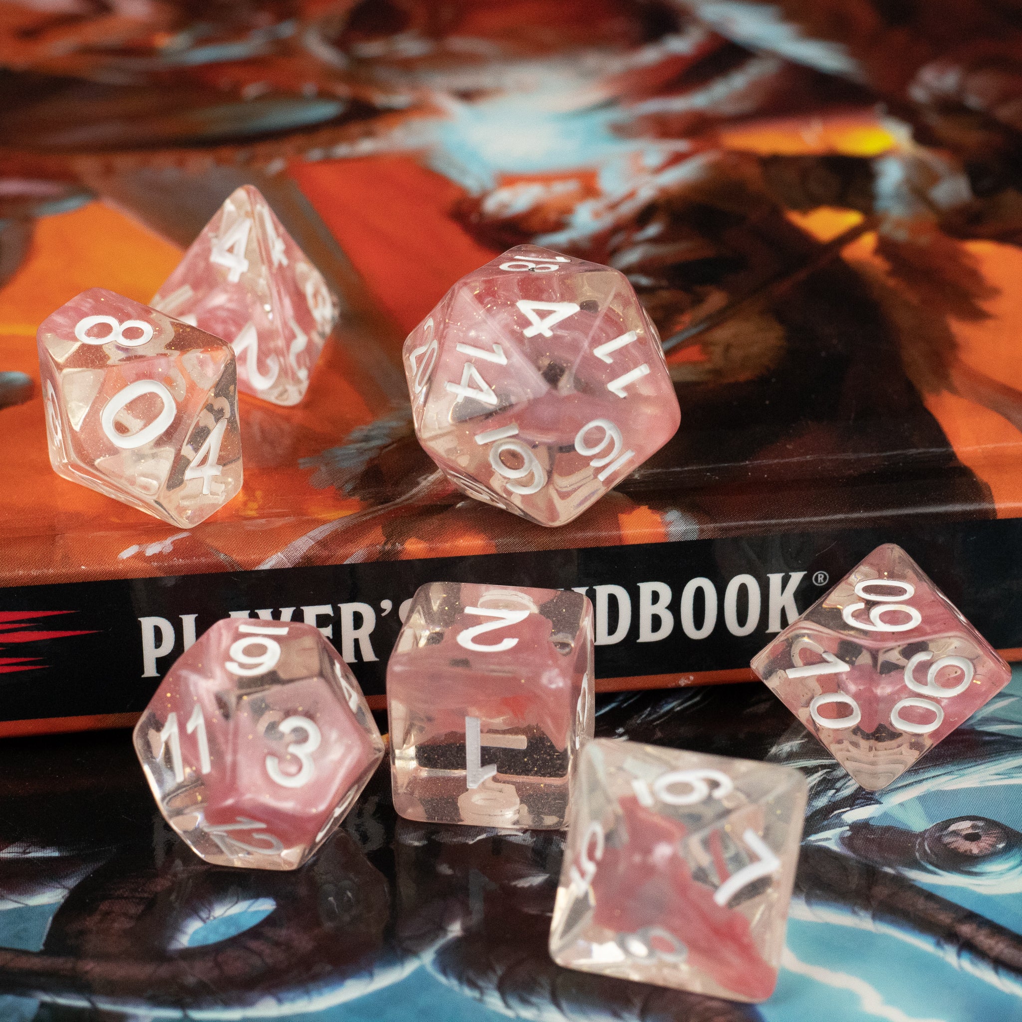 Pink Lava Lamp Dice Set - Set of translucent pink polyhedral dice with white numbers, including d20, d12, d10, d8, d6, and d4, displayed on a game.