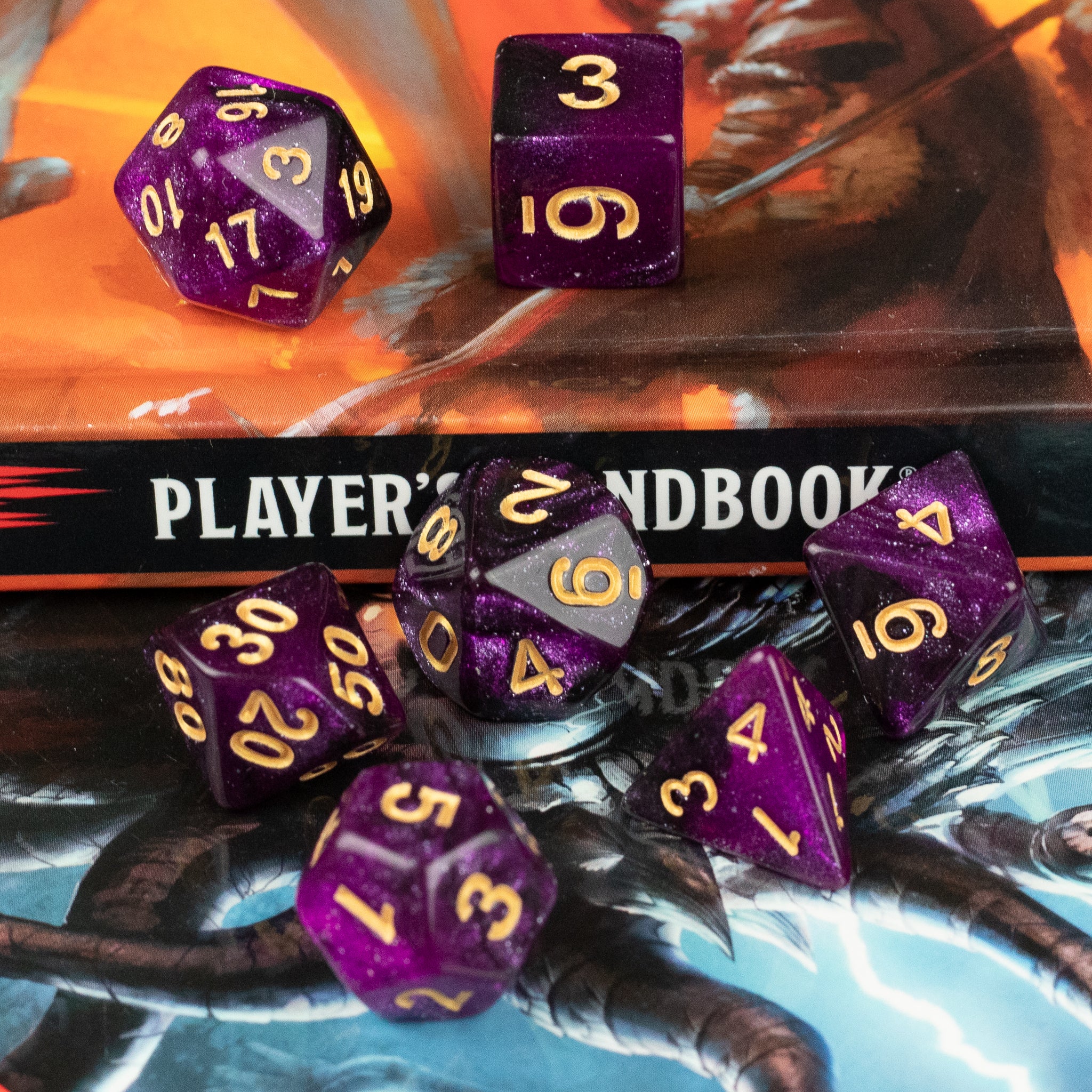 Purple and Black Glitter Dice Set - Purple and black glitter seven-piece dice set with gold numbers on tabletop background.