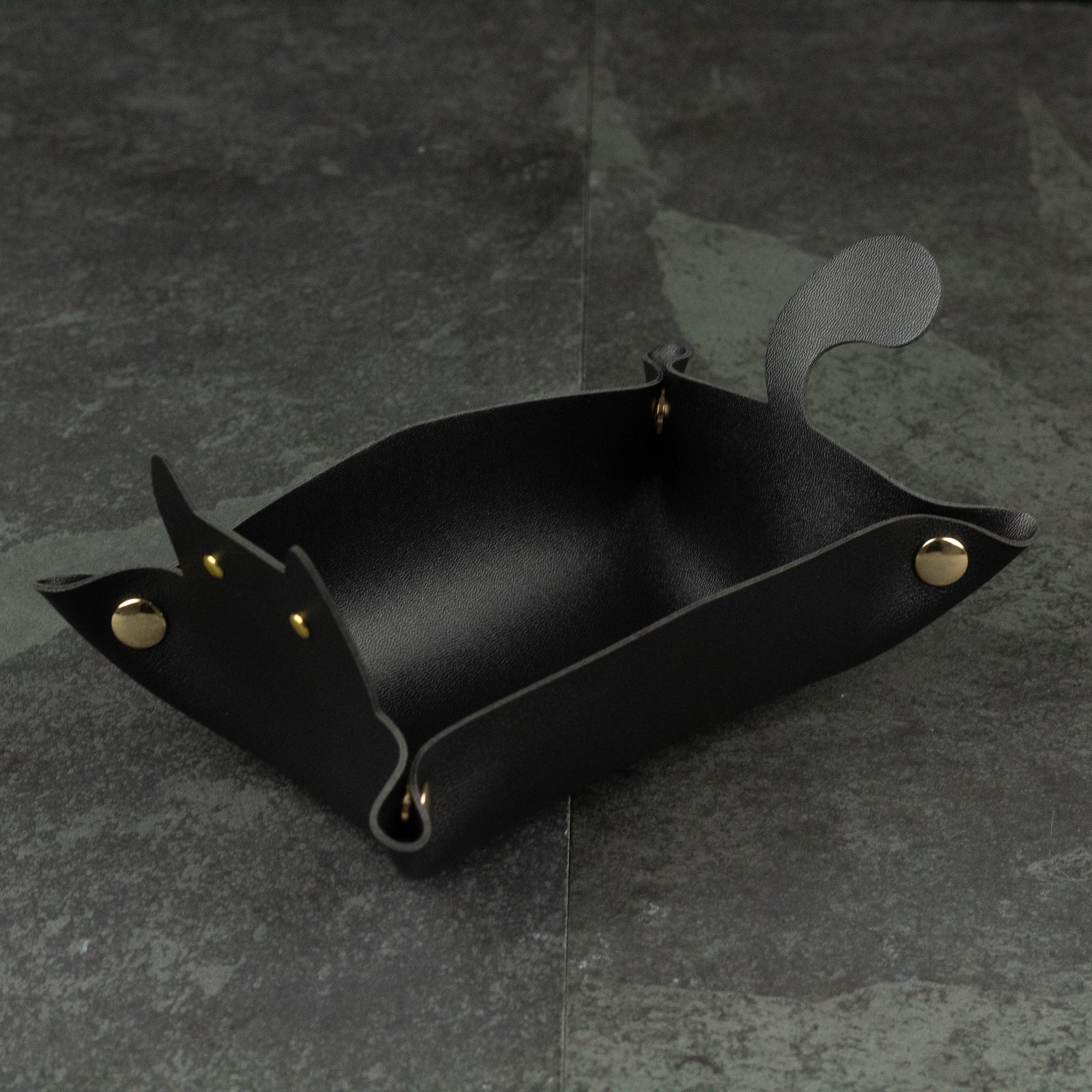 Cat Shaped Dice Tray - Black leather dice tray shaped like a cat with pointed ears and a curled tail, secured with brass snaps.