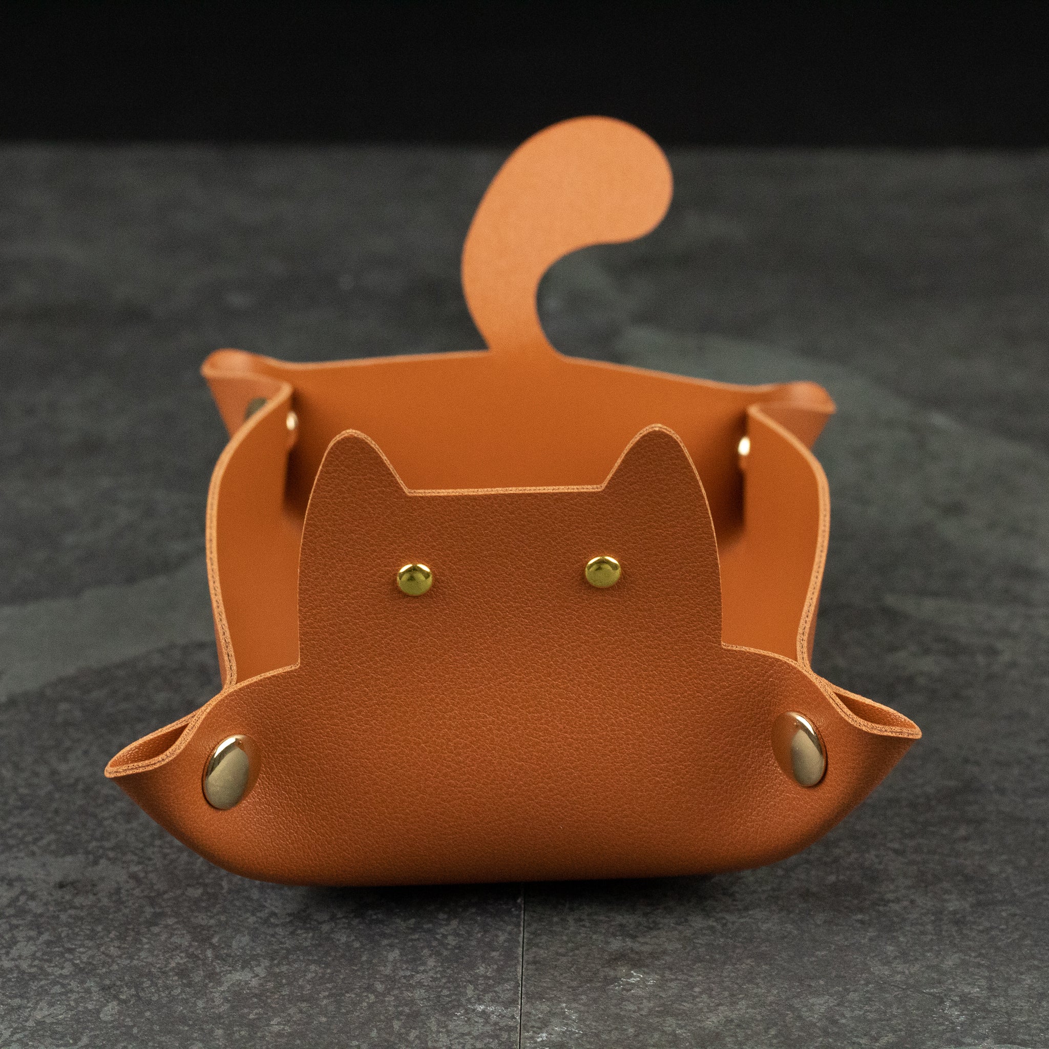 Cat Shaped Dice Tray - Brown leather dice tray shaped like a cat with ears, tail, and brass button accents.