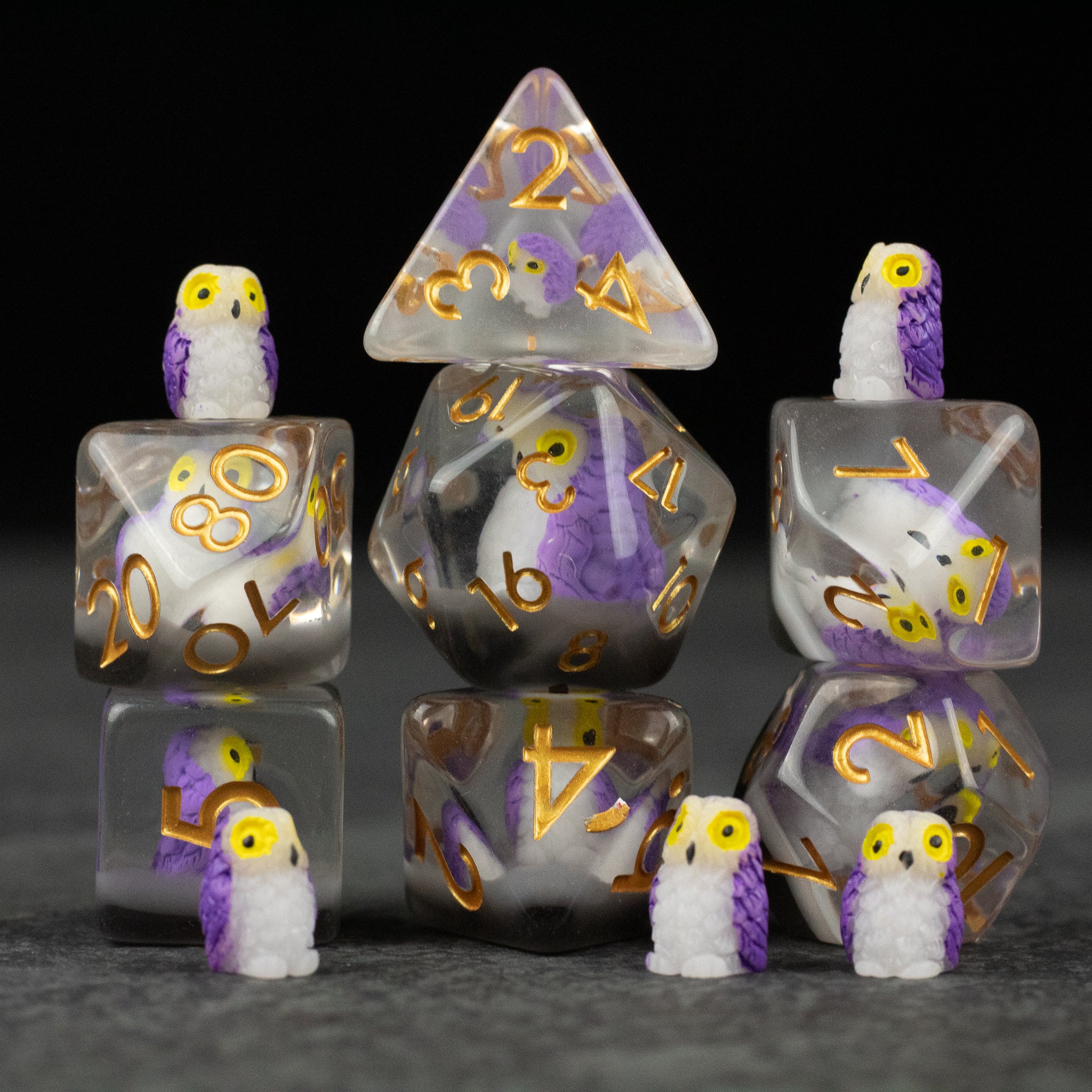 Purple Owl Dice Set - Clear dice set with gold numbers, containing purple and white owls inside each die.