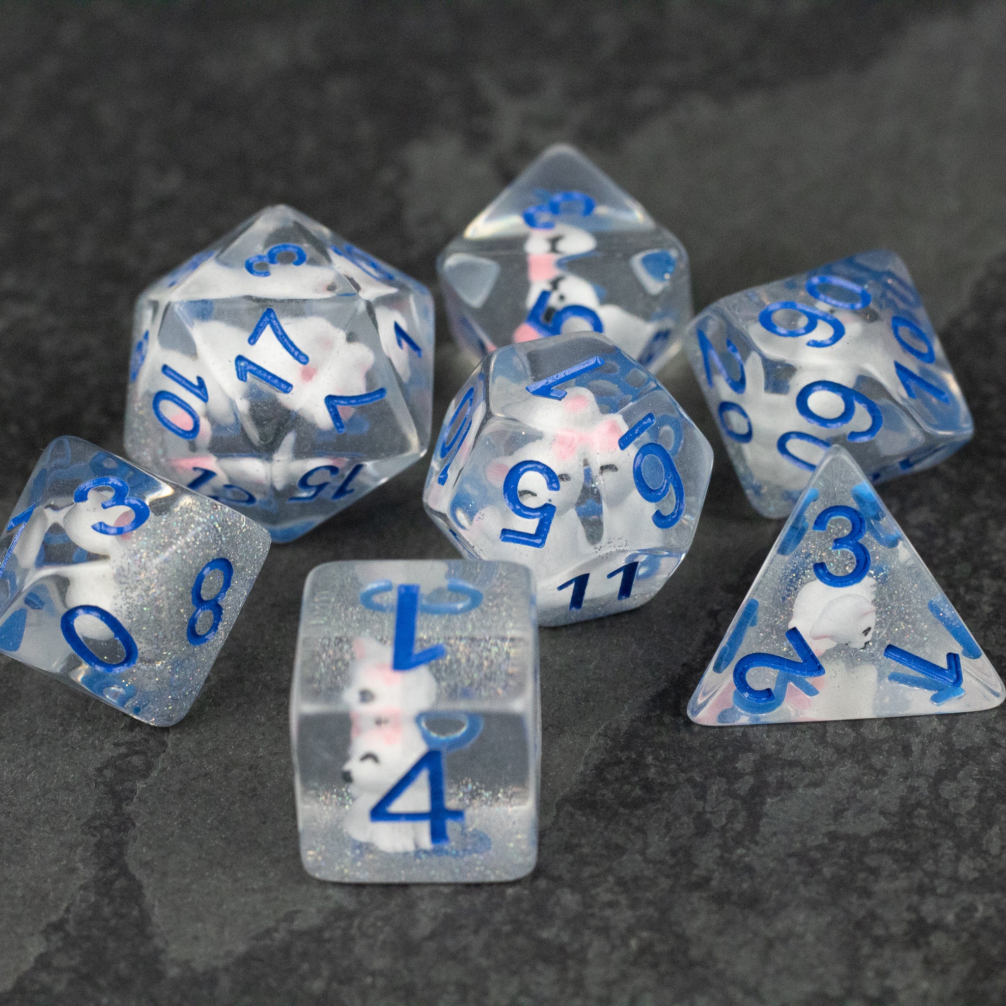 Artic Fox Dice Set - Clear dice set with blue numbers and small white and blue fox figures inside each die.