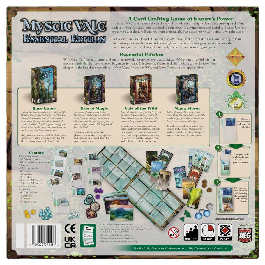 Mystic Vale Essential Edition - Mystic Vale Essential Edition board game box with game cards, tokens, and player boards displayed on a wooden surface.