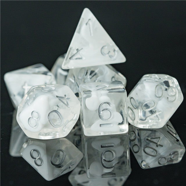 White Swirl Dice Set - Translucent white swirl polyhedral dice set with silver numbers, including d4, d6, d8, d10, d12, and d20 on reflective.