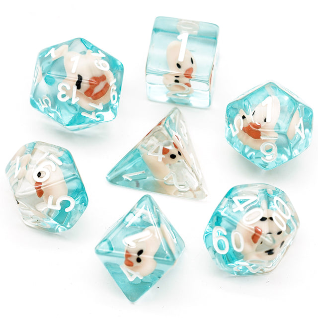 White Duck Dice Set - Translucent aqua blue dice set with white numbers and white duck illustrations inside each die, featuring standard.