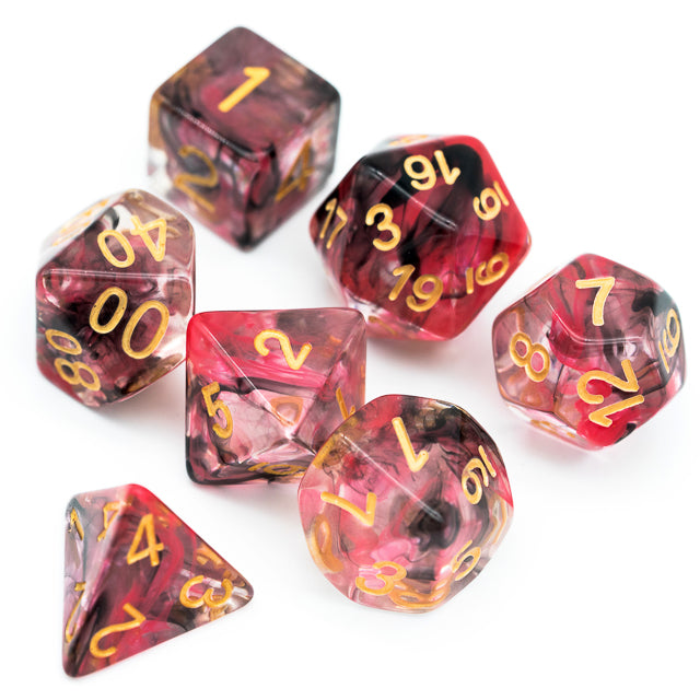 Pink & Black Smoke Dice Set - Pink and black smoky polyhedral dice set with gold numbers, including d20, d12, d10, d8, d6, and d4.