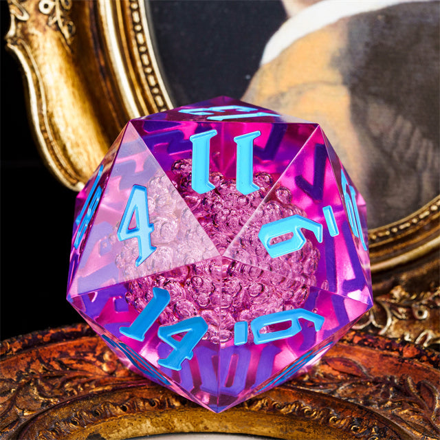 Giant 55mm D20 - Pink Bubbles - Giant 55mm pink acrylic 20-sided dice with bright blue numbers and bubble texture inside.