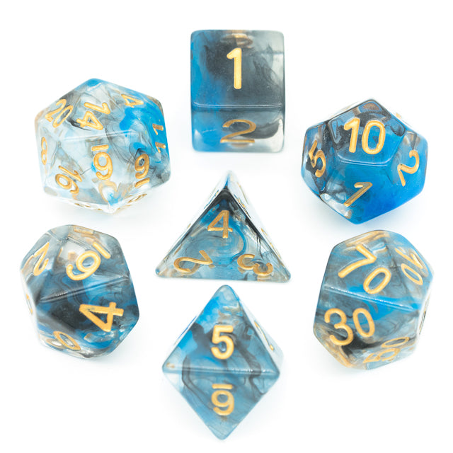 Blue & Black Smoke Dice Set - Seven blue and black smoky polyhedral dice with gold numbers, including d4, d6, d8, d10, d12, and d20.