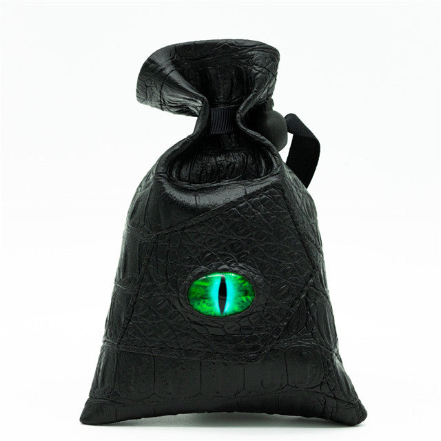 Mimic Dice Bag - Black faux leather dice bag with textured surface and a green reptilian eye detail on the front.