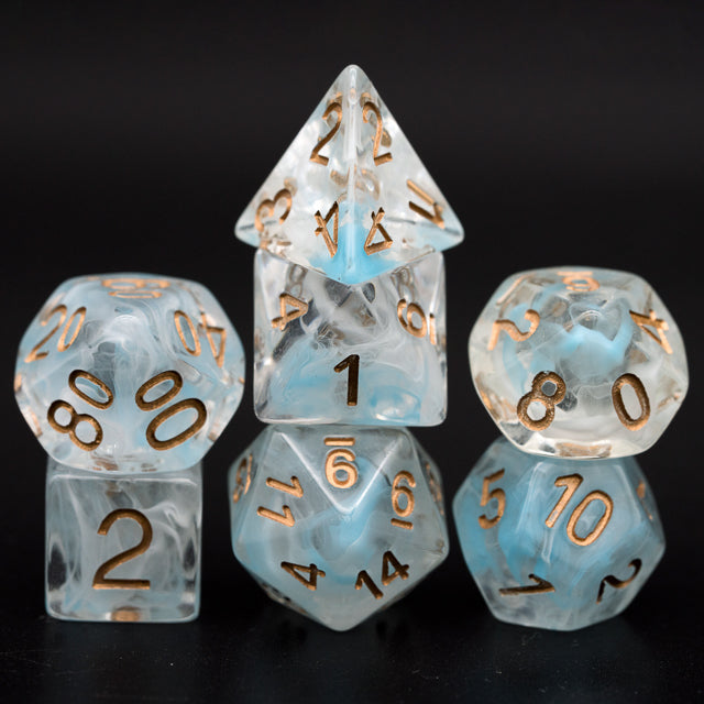 Cyan Smoke Dice Set - Cyan smoke translucent dice set with gold numbers, including d20, d12, d10, d8, d6, and d4.