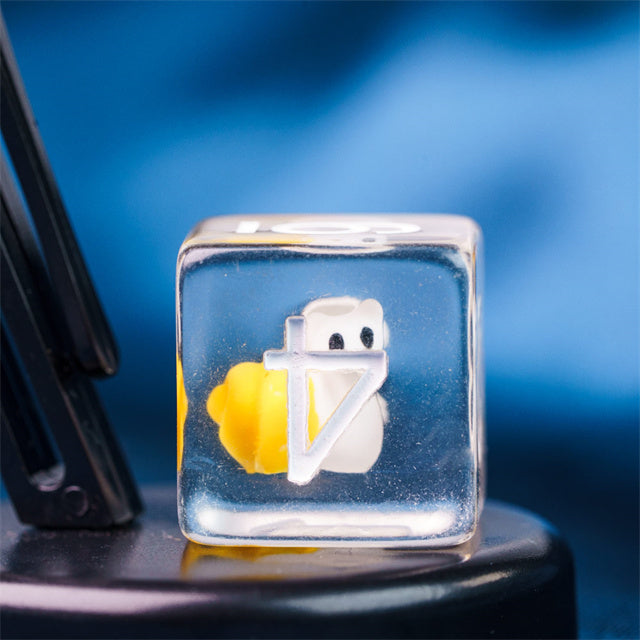 Snail Dice Set - Clear resin dice with a miniature white and yellow snail encased inside.