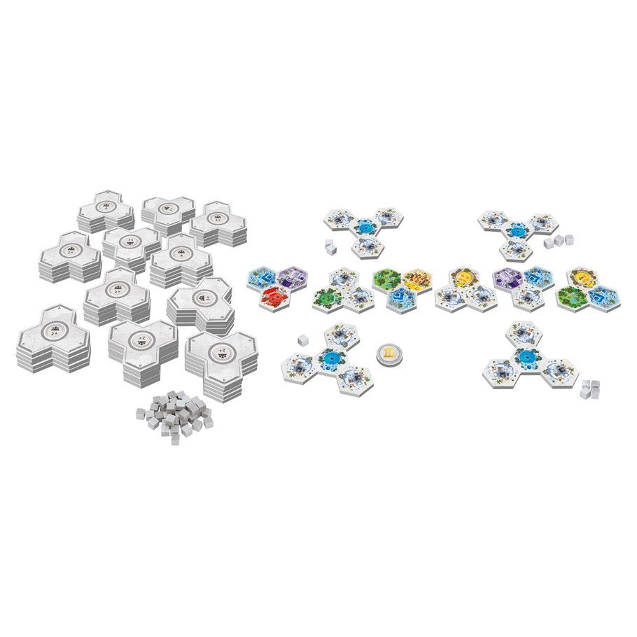 Akropolis - Hexagonal game tiles with colorful cityscape illustrations and small gray and white circular pieces on a white surface.