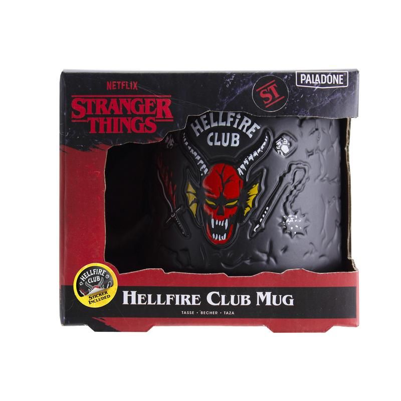 Hellfire Club Mug - Black ceramic mug with embossed Hellfire Club logo featuring a red devil face, lightning bolts, and "ST" initials, packaged.