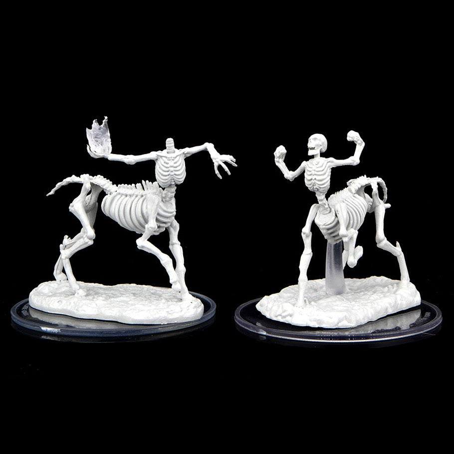 Critical Role Mini: Skeletal Centaurs - Two white skeletal centaur miniatures posed dynamically on oval bases with black rims against a black background.