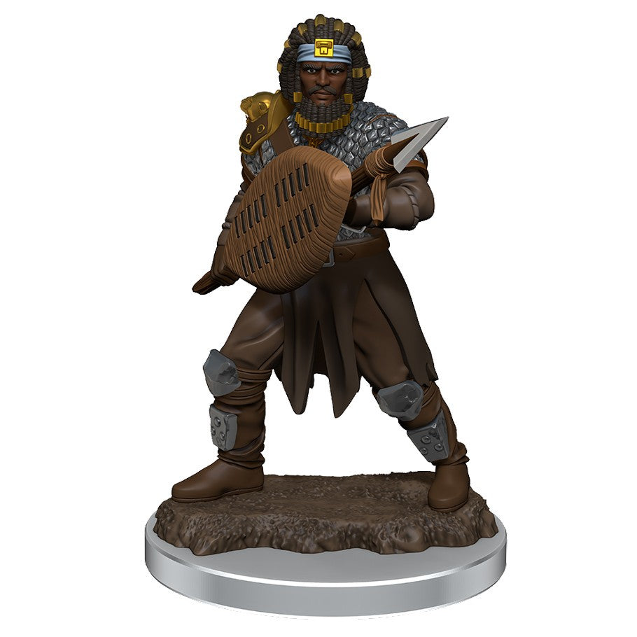 D&D: Icons of the Realms: Male Human Fighter - Male human fighter miniature in chainmail and brown armor holding a shield and dagger on rocky base.
